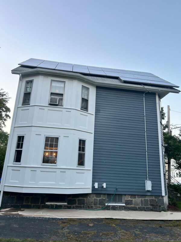 exterior house painting & surface restoration — after