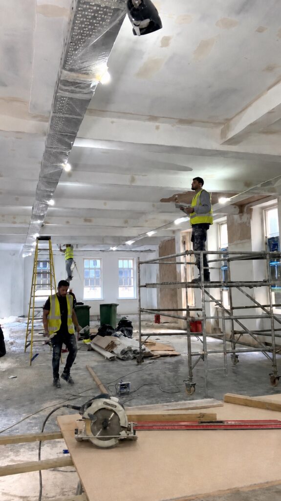 Commercial interior with updated flooring and painted walls