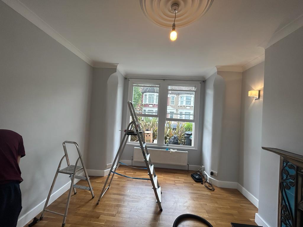 Residential living room during painting